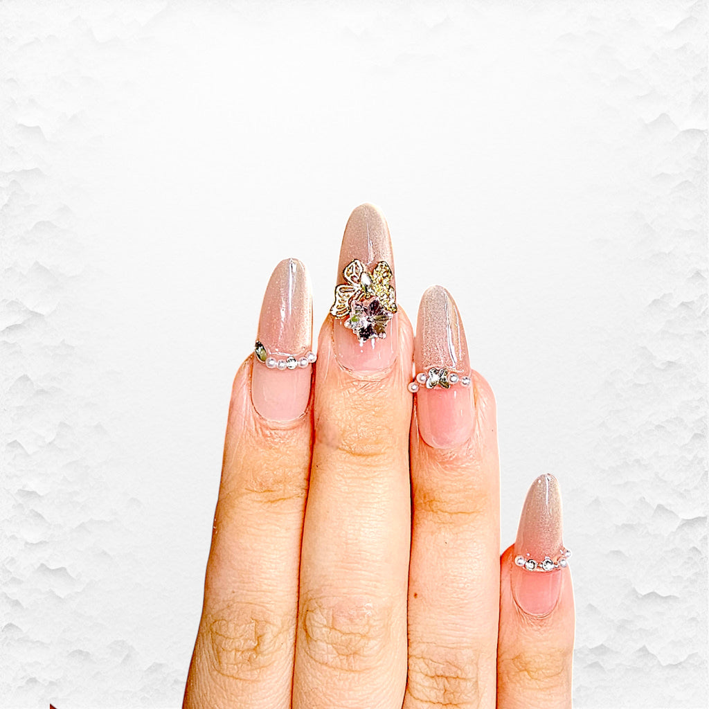 Press on nails, Ovala med bling